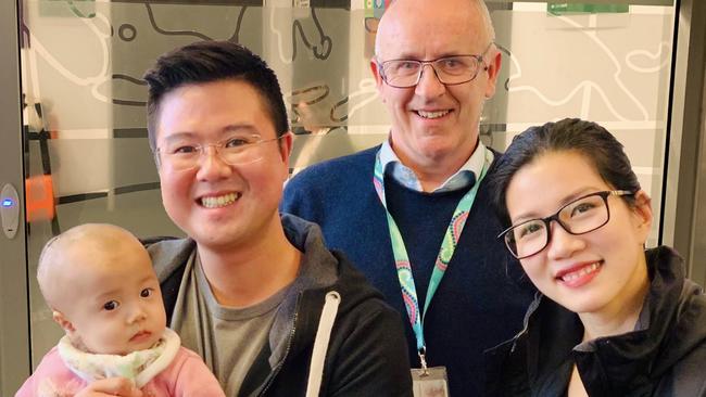 Renee, Edo and Andriani with the head of the Australian Craniofacial Unit, Dr Mark Moore, who carried out her successful surgery.