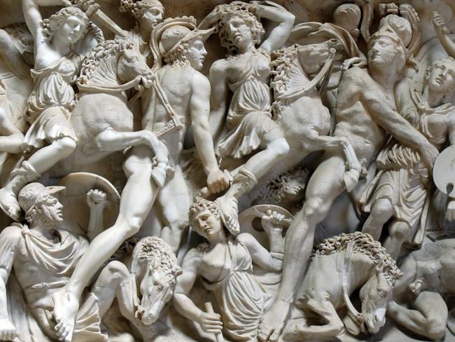 A detailed section of carvings/sculture depicting a scene of carnage in Rome. Vatican.