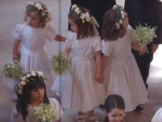 Princess Charlotte took her role as bridesmaid at Meghan and Harry’s wedding very seriously. Picture: BBC via YouTube