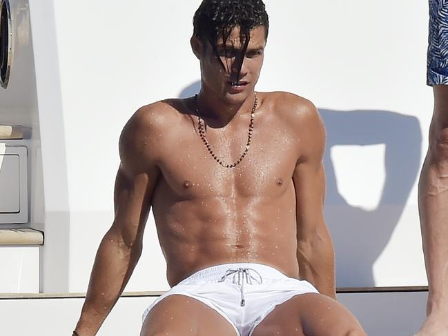 AU_1954435 - portofino, ITALY  - BGUK_1954431 - Cristiano Ronaldo and his partner Georgina Rodriguez on a boat in Portofino  Pictured: Cristiano Ronaldo  BACKGRID Australia 28 JUNE 2020   BYLINE MUST READ: Cobra Team / BACKGRID  Phone: + 61 419 847 429 Email:  sarah@backgrid.com.au *CLIENT RESTRICTION APPLIED*