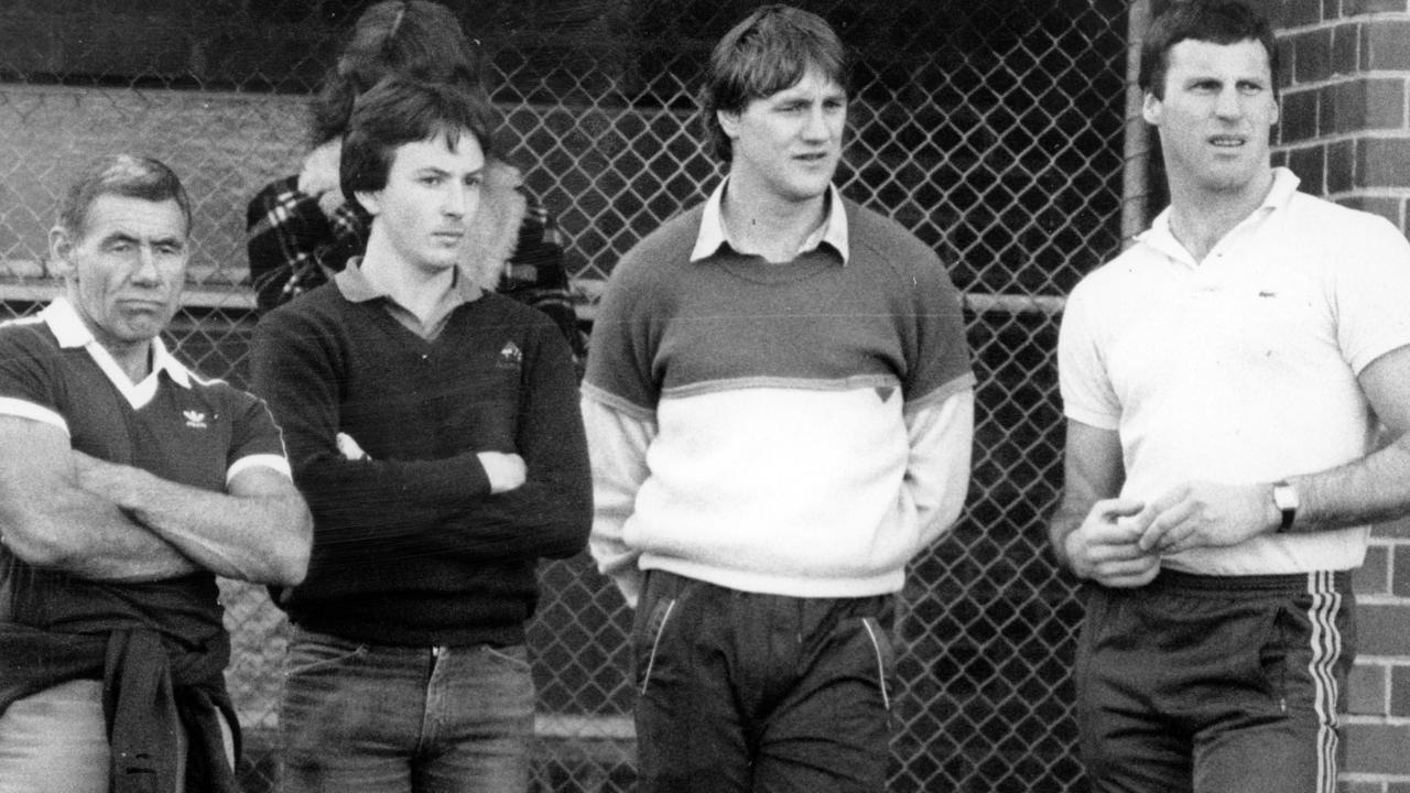 Tom Hafey and Billy Picken watch a training session.