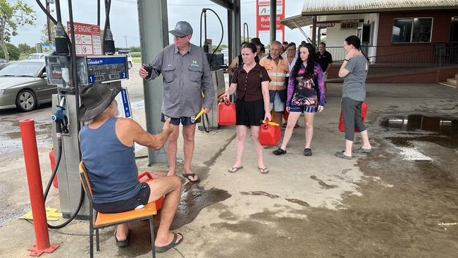 Ingham identity Andy Barra dispenses free fuel to disaster-struck Ingham residents. Picture: Cameron Bates