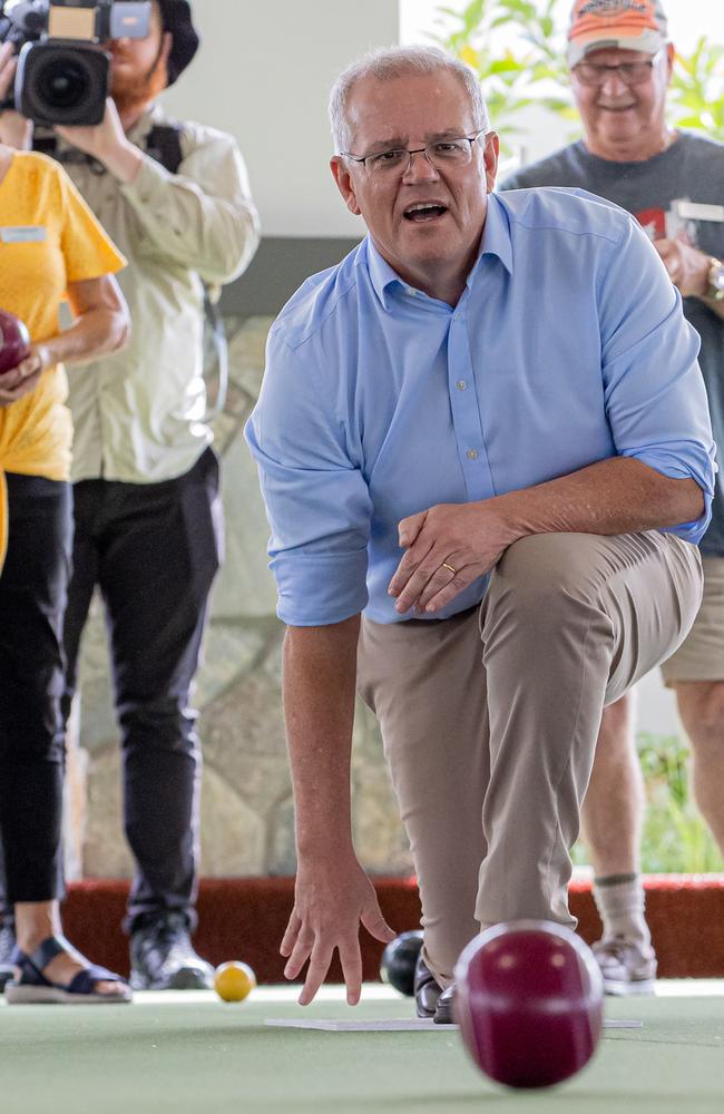 The PM plays lawn bowls with the residents at the Living Gems Retirement Village in South Caboolture, Brisbane. Picture: Jason Edwards.