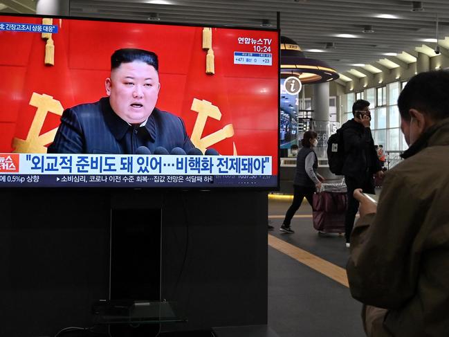 People watch a television screen at Suseo railway station in Seoul as a news program reports about the North's latest tactical guided projectile test. Picture: Jung Yeon-je / AFP