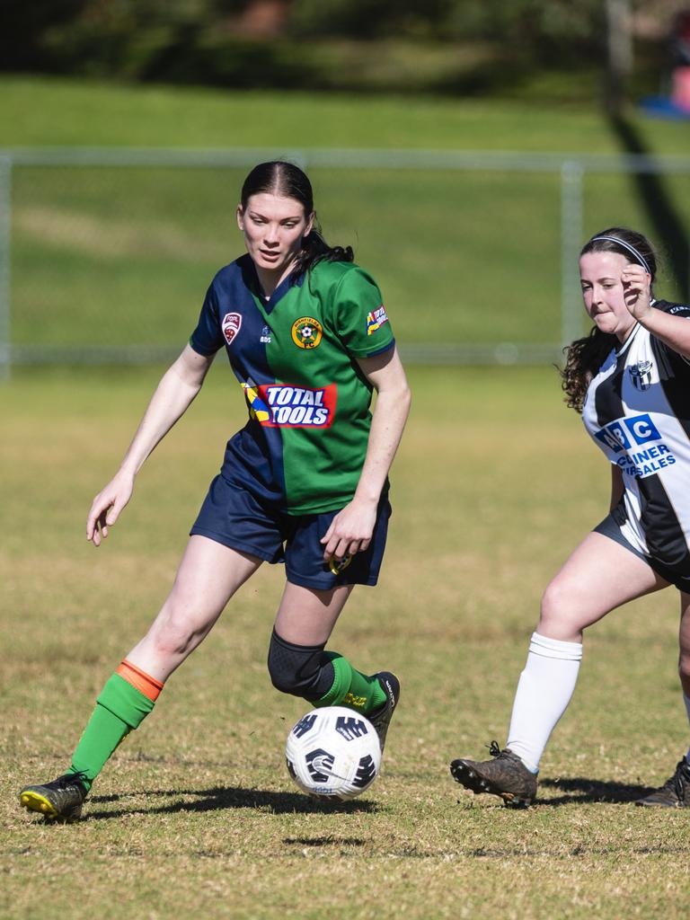 Rahni Pritchard (left) of Highfields against Willowburn in FQPL Women Darling Downs Presidents Cup football at West Wanderers, Sunday, July 24, 2022. Picture: Kevin Farmer