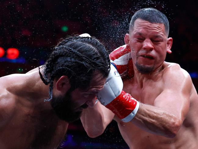 ANAHEIM, CALIFORNIA - JULY 06: (L-R) Jorge Masvidal and Nate Diaz during round nine of their cruiserweights fight at Honda Center on July 06, 2024 in Anaheim, California.   Ronald Martinez/Getty Images/AFP (Photo by RONALD MARTINEZ / GETTY IMAGES NORTH AMERICA / Getty Images via AFP)