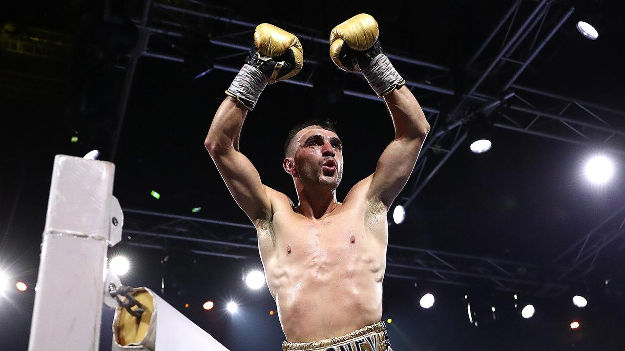 Jason Moloney celebrates victory over Nawaphon Kaikanha at Rod Laver Arena on October 16, 2022 in Melbourne, Australia. (Photo by Kelly Defina/Getty Images)