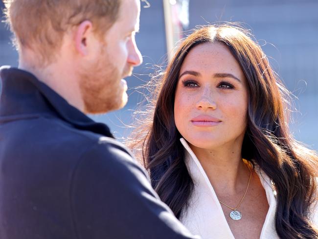 THE HAGUE, NETHERLANDS - APRIL 17: Prince Harry, Duke of Sussex and Meghan, Duchess of Sussex attend the Athletics Competition during day two of the Invictus Games The Hague 2020 at Zuiderpark on April 17, 2022 in The Hague, Netherlands. (Photo by Chris Jackson/Getty Images for the Invictus Games Foundation)