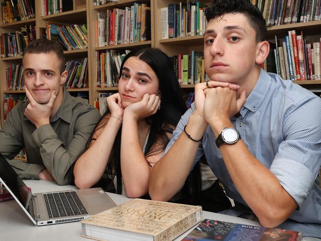 Alphington Grammar School Year 12 students Evan Beltsis 18, Isabella Cohn 18 and Ethan Maratheftis 18 who are waiting nervously for their ATARs and study scores which will be released on Monday.                     Picture: David Caird