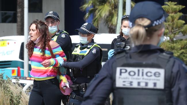 Police arrested this woman at St Kilda. Picture: David Crosling