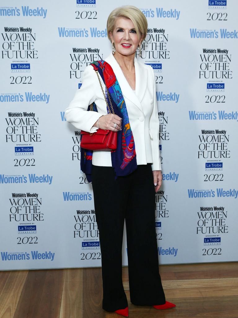 Julie Bishop turned heads in her simple white and black suit paired with pops of red.