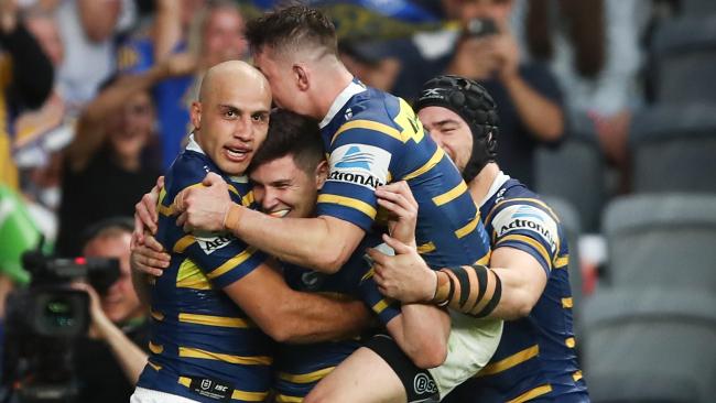 Mitchell Moses is congratulated after scoring a try for the Eels. Picture: AAP