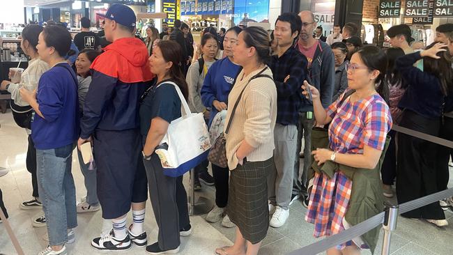 A huge line-up of customers waited for Uniqlo's opening at Garden City on Thursday. Picture: Jonathan O'Neill