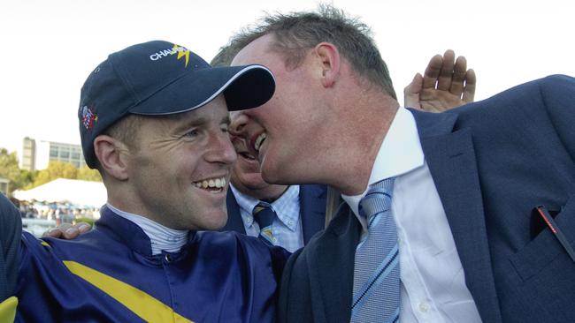 Tommy Berry and Michael Hawkes share a laugh at Randwick. Picture: Jenny Evans