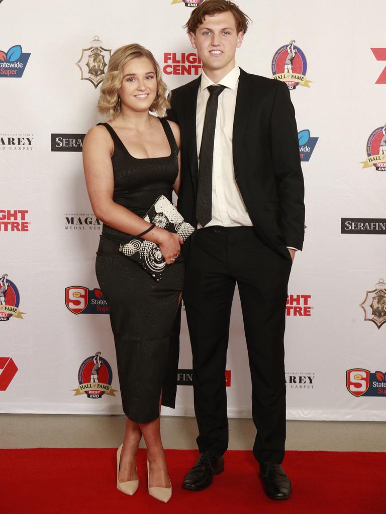 Georgia Tiller and Harrison Magor pose for a picture on the red carpet at Adelaide Oval in North Adelaide, for the Magarey Medal, Monday, September 9, 2019. Picture: Matt Loxton