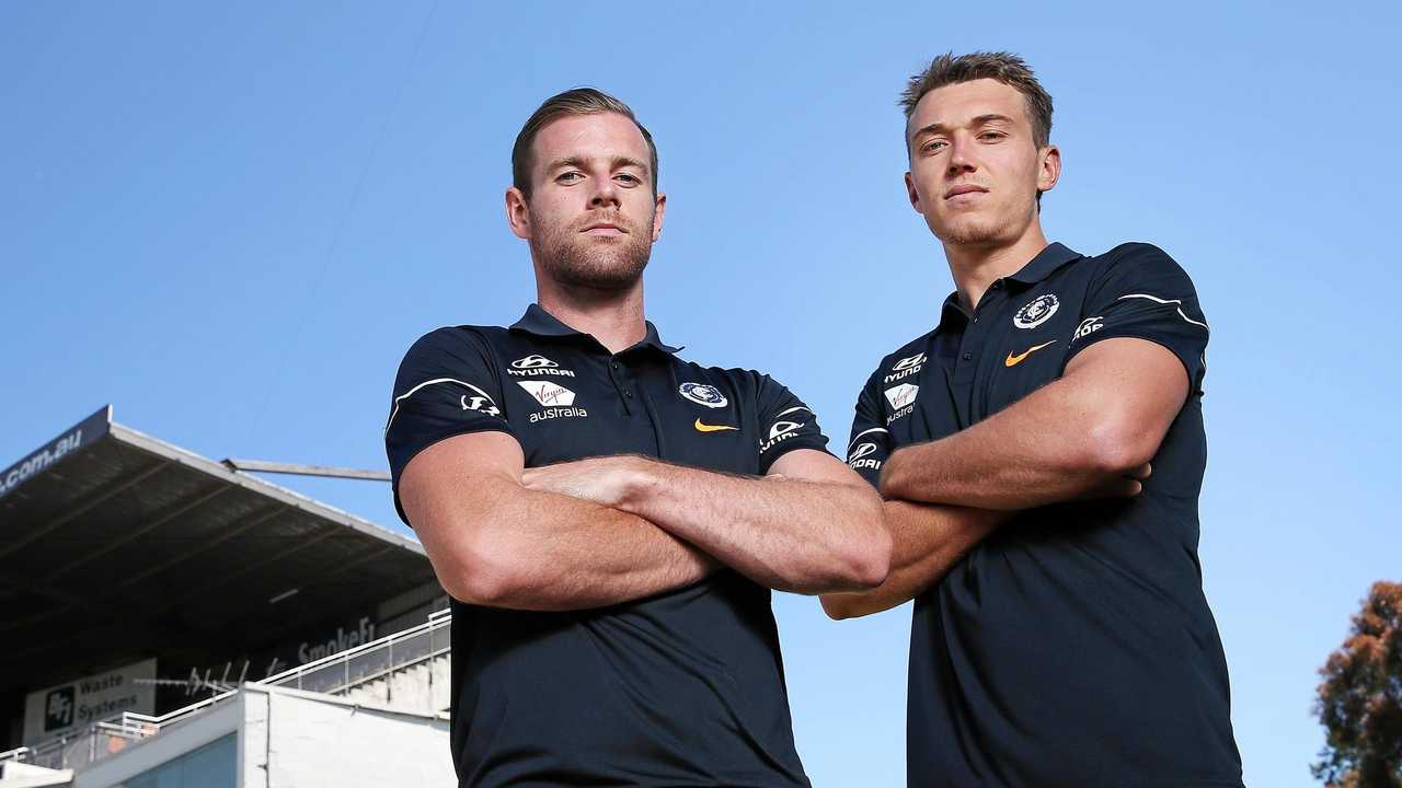 CRUEL BLOW: New Carlton co-captain Sam Docherty (left) will miss another season of AFL football after rupturing his ACL at training on Monday. Picture: Michael Dodge