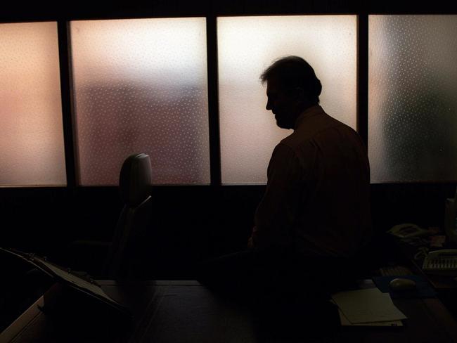 Generic image. Silhouette of a man (parent of) a sex abuse victim in an office. wrongly accused of touching young girl. Child sexual abuse. sex crime incest paedophilia.