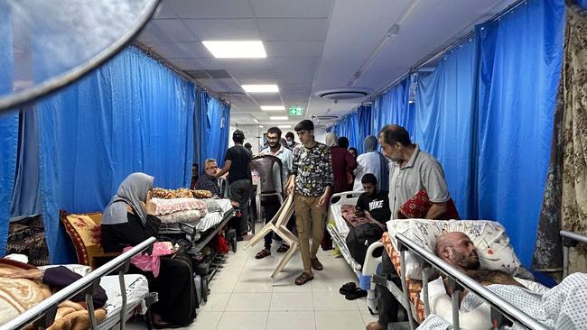 Patients and internally displaced people at al-Shifa hospital in Gaza City at the weekend. Picture: AFP