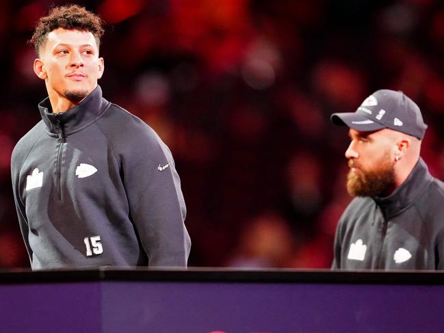 LAS VEGAS, NEVADA - FEBRUARY 05: Patrick Mahomes (L) and Travis Kelce of the Kansas City Chiefs walk onto the stage during Super Bowl LVIII Opening Night at Allegiant Stadium on February 05, 2024 in Las Vegas, Nevada.   Chris Unger/Getty Images/AFP (Photo by Chris Unger / GETTY IMAGES NORTH AMERICA / Getty Images via AFP)