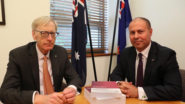 Commissioner Kenneth Hayne and Treasurer Josh Frydenberg with the final report from the Royal Commission into Misconduct in the Banking, Picture: Kym Smith