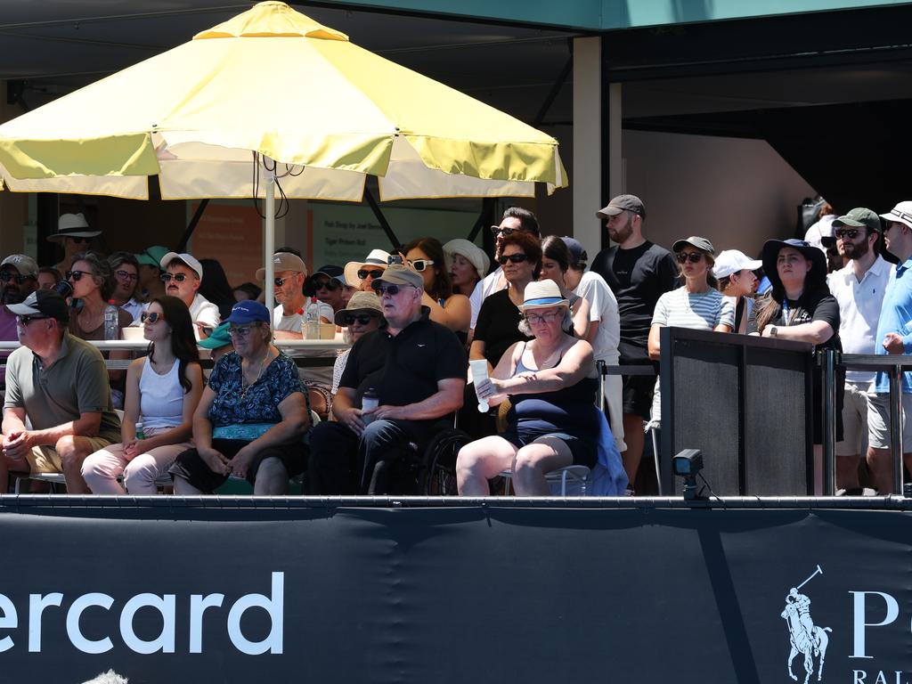 Fans watch on from the bar next to Court 6. Picture: David Caird