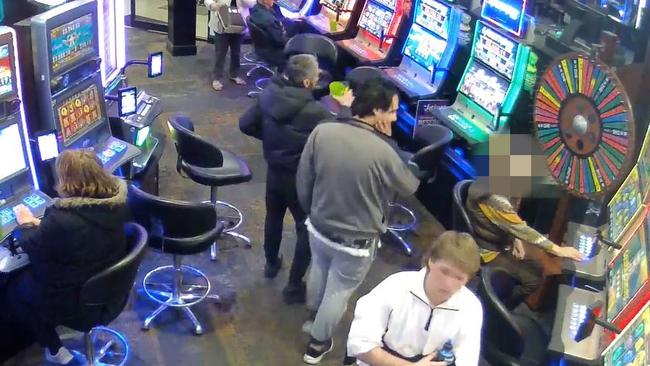 Joobin Rafii and Nima Saboohian watches his 85-year-old woman victim who he would later rob of her pokies winnings. Picture: Courts Administration Authority.