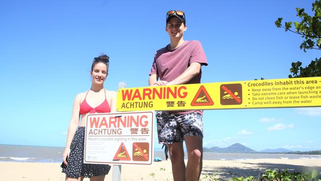 Mount Sheridan residents Madi Thieme and Mitchell Cooper are concerned about a large saltwater croc frequenting an area at the southern end of Palm Cove. Picture: PETER CARRUTHERS