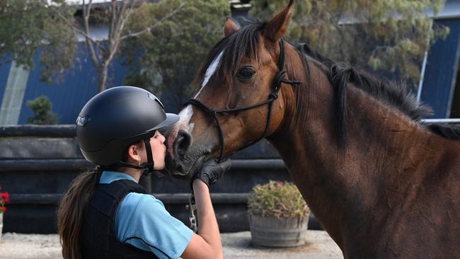 Geelong Grammar School Year 8 student Jeanne Harvey with her horse Benny.