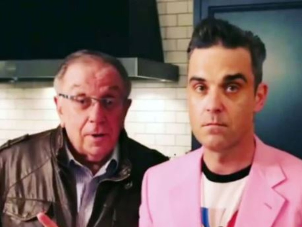 Robbie Williams’ dad Pete Conway has been rushed to hospital after “breaking his spine.”