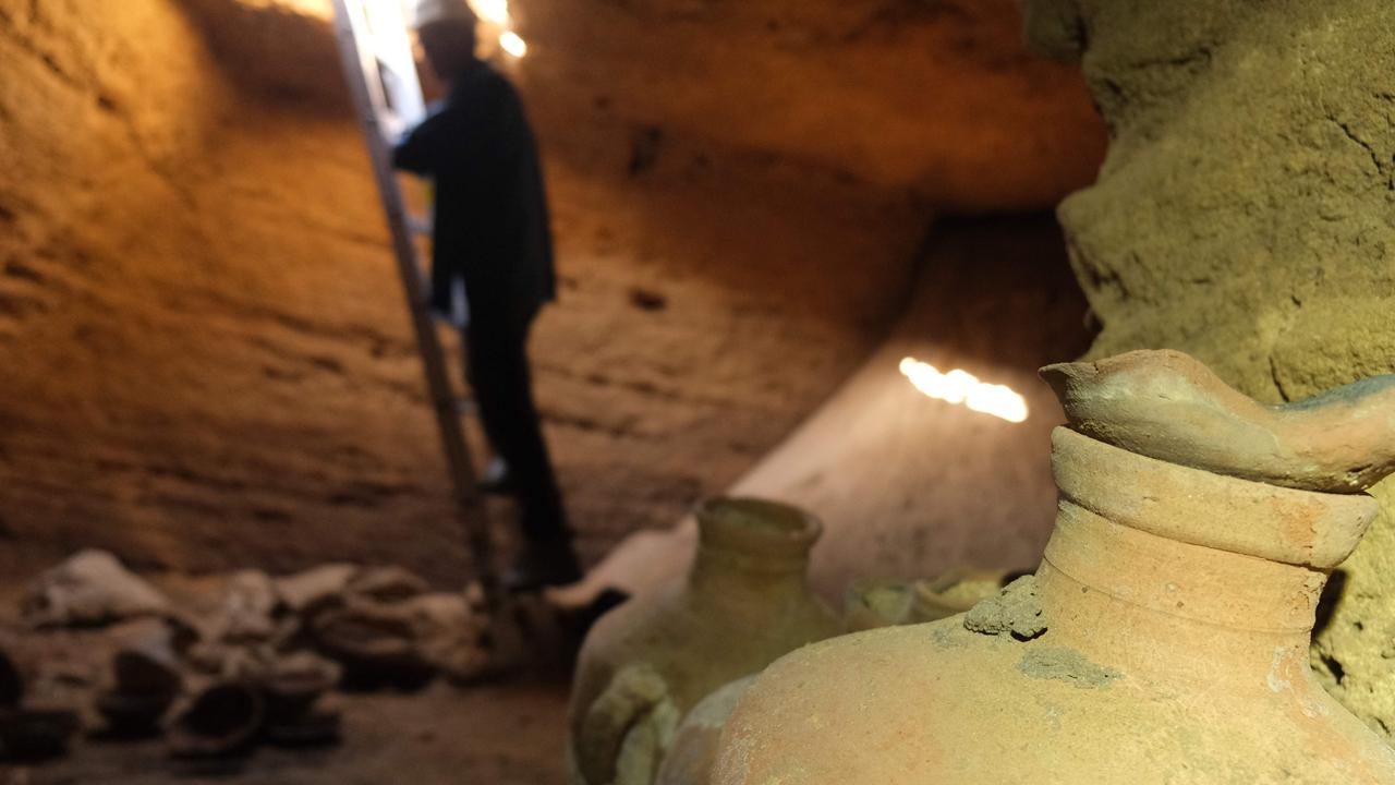 The cave contains untouched finds such as pottery vessels, dating back to the thirteenth century BCE. Picture: Emil Aladjem/Israeli Antiquities Authority/AFP