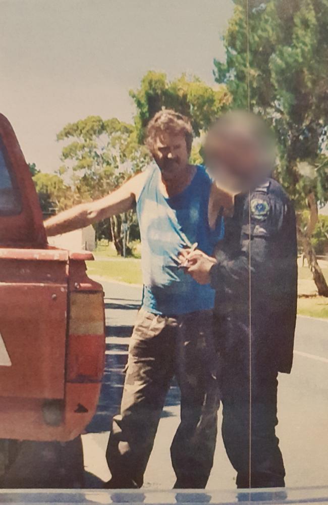 Police talking to Gene Bristow the day before his arrest. Picture: SA Police