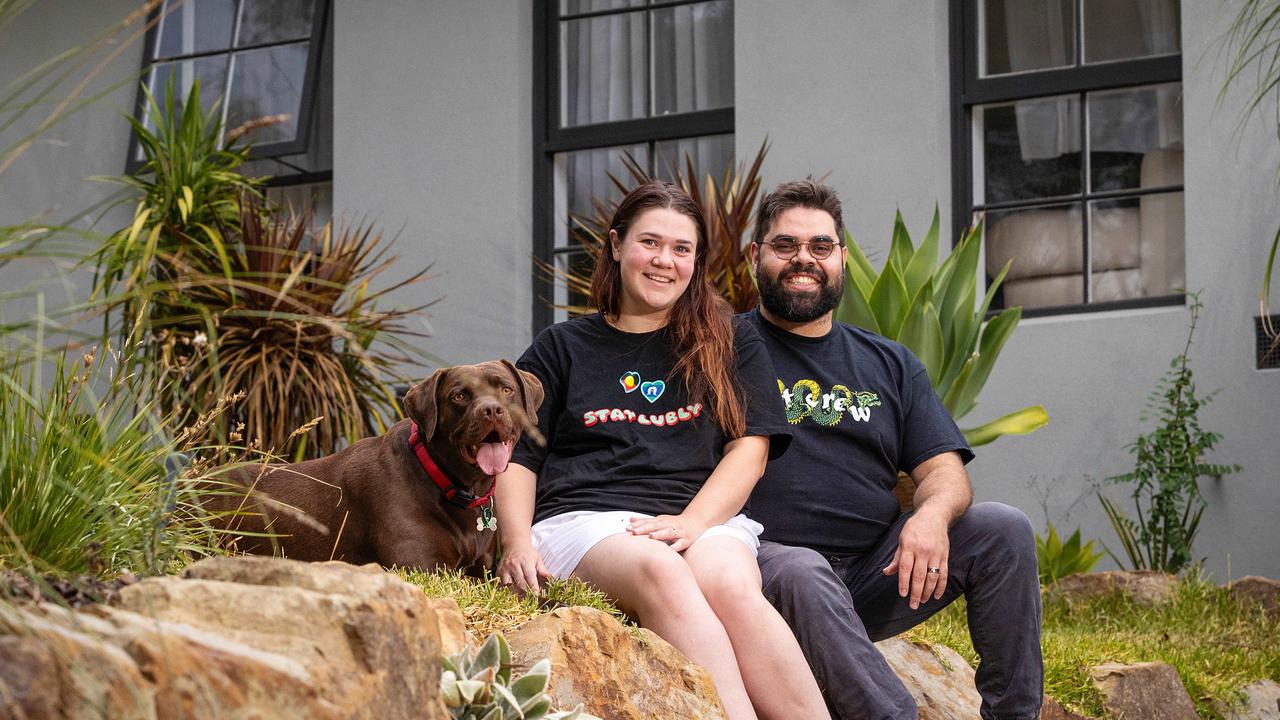 Tiana and Jesse, with their dog Tobé, love having their wider family visit them at home. Picture: Mark Stewart.