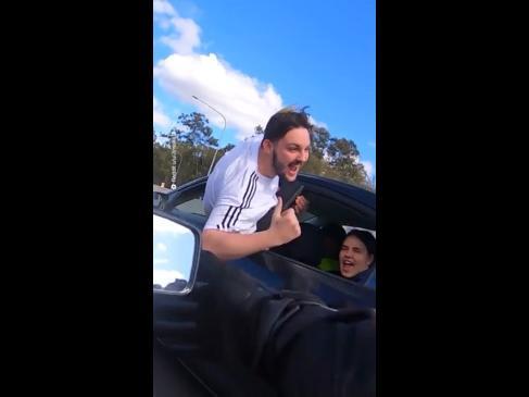 P-Platers hang out of car on the motorway