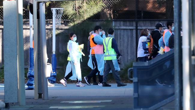 Pictured are cleaning crews at Lane Cove West Public School.