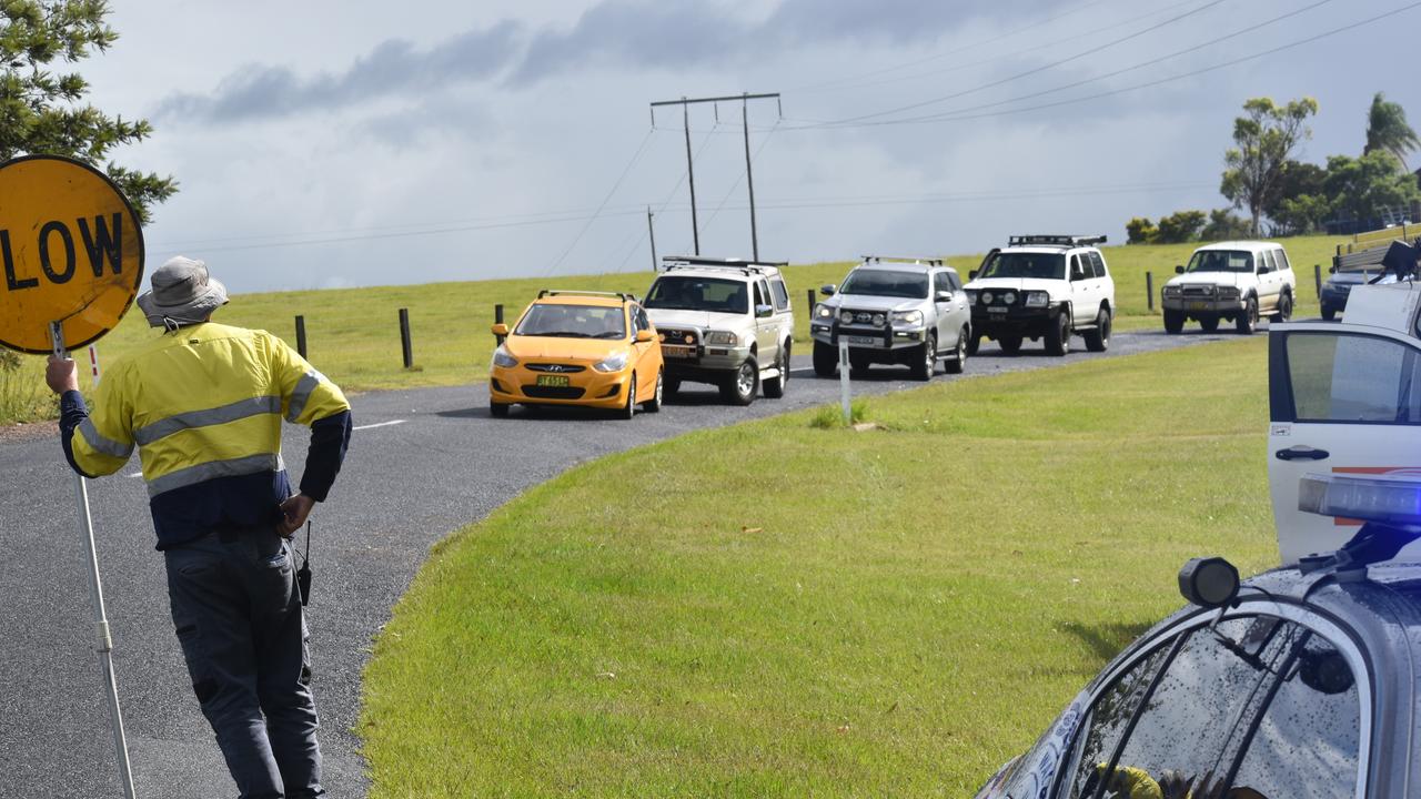 Traffic was blocked in both directions after a red sedan Mitsubishi Lancer sedan crashed into a power pole on Rogans Bridge Rd north of Waterview Heights on Thursday, 18th February, 2021. Photo Bill North / The Daily Examiner