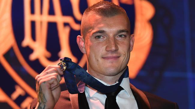 Dusty with his Brownlow. Picture: AAP/Julian Smith