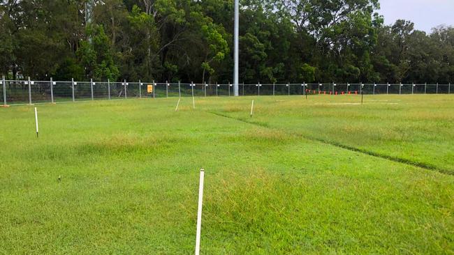 White posts mark the fire ant nests on the Cyclones field at Redland Bay. Picture: JUDITH KERR