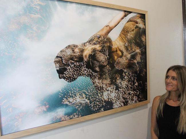 Leah McLean with one of her works. Picture: ANDREW KACIMAIWAI