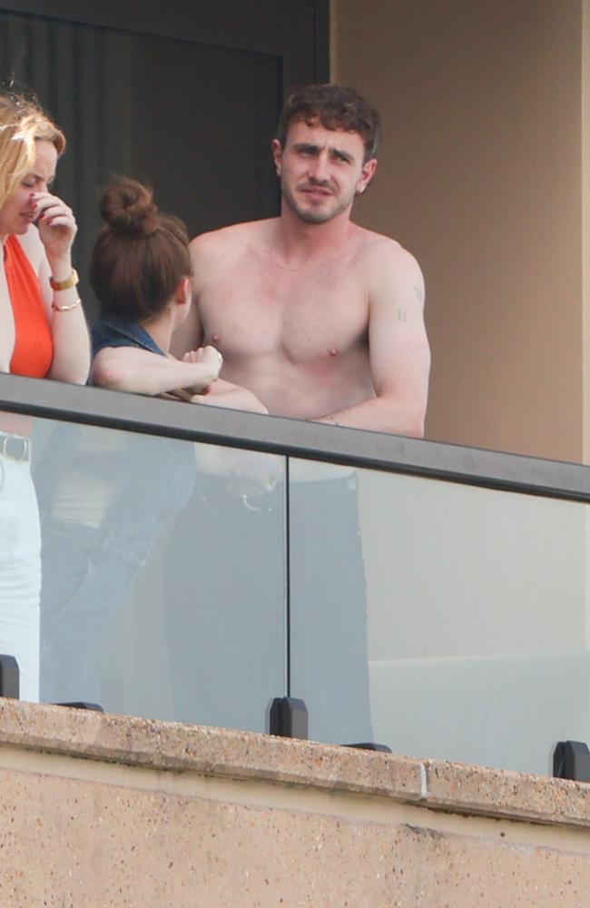 Paul Mescal is pictured shirtless on his Sydney hotel balcony on Thursday afternoon. Picture: KHAP/BACKGRID