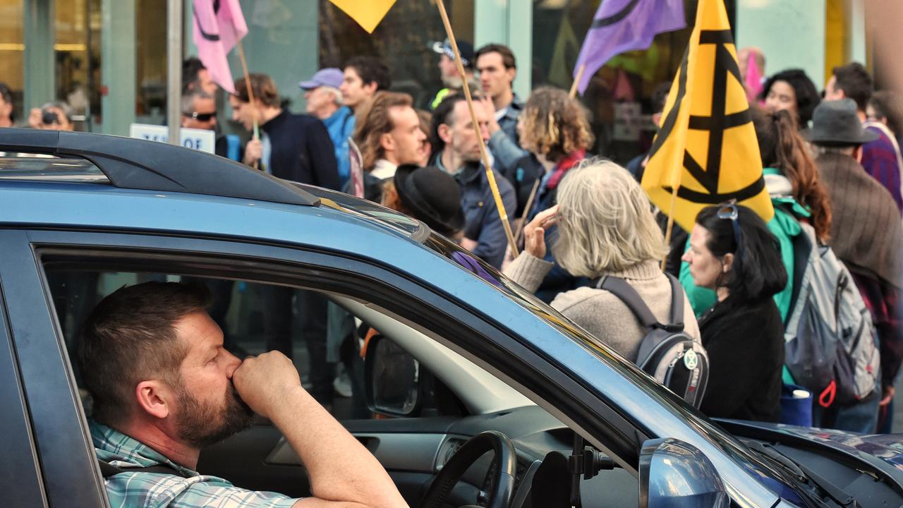 Extinction Rebellion protesters block traffic in Melbourne. Picture: Jason Edwards