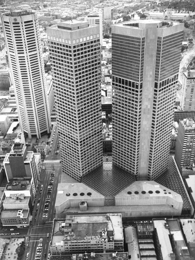 An aerial photograph shows the twin towers of Collins Place.