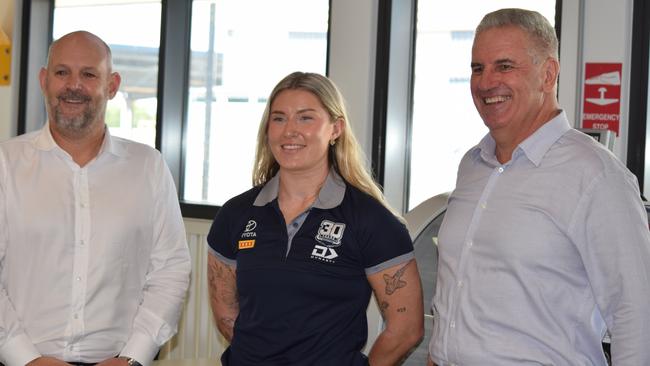 Cowboys NRL chief executive Jeff Reibel, with NRLW Cowboys player Makenzie Weale and Manufacturing Minister Dale Last at the Bohle TAFE campus.