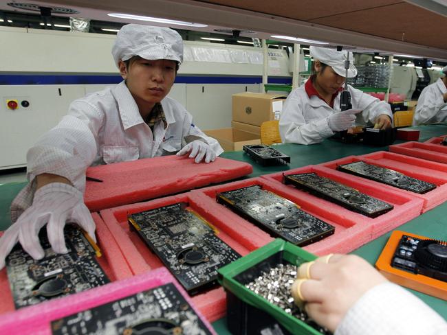 While your iPhone was probably assembled in China, most of the parts weren’t made there. Picture: Kin Cheung / AP