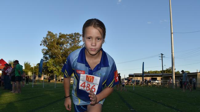 Mia Power, 9, gets ready to run.