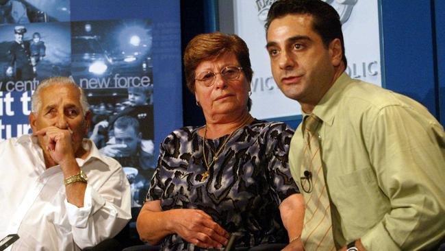 Andrew Landos and his parents Kyriakos and Nicki in 2003 talking about John’s disappearance.