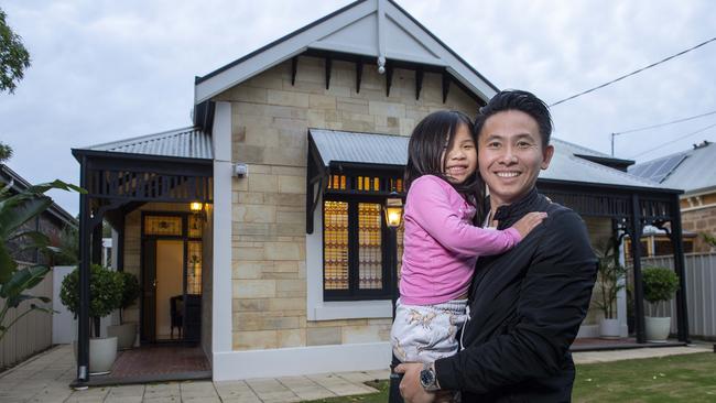 Jeremy Lim and his daughter Amaris Lim at their Norwood home that is listed for sale. The suburb has been listed as a hotspot for investors. Picture: Mark Brake.