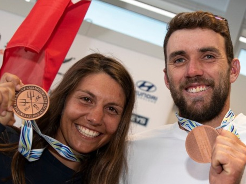 Lisa Darmanin and Jason Waterhouse with their medal.