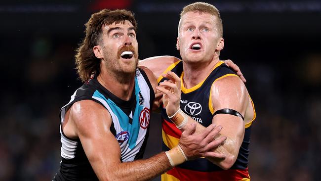 Scott Lycett contests the ruck with Reilly O’Brien in Showdown 49. Picture: James Elsby/AFL Photos via Getty Images