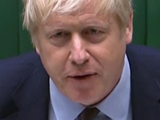 A video grab from footage broadcast by the UK Parliament's Parliamentary Recording Unit (PRU) shows Britain's Prime Minister Boris Johnson speaking during Prime Minister's Question time (PMQs) in the House of Commons in London on May 26, 2021. (Photo by Handout / various sources / AFP) / RESTRICTED TO EDITORIAL USE - MANDATORY CREDIT " AFP PHOTO / PRU " - NO USE FOR ENTERTAINMENT, SATIRICAL, MARKETING OR ADVERTISING CAMPAIGNS