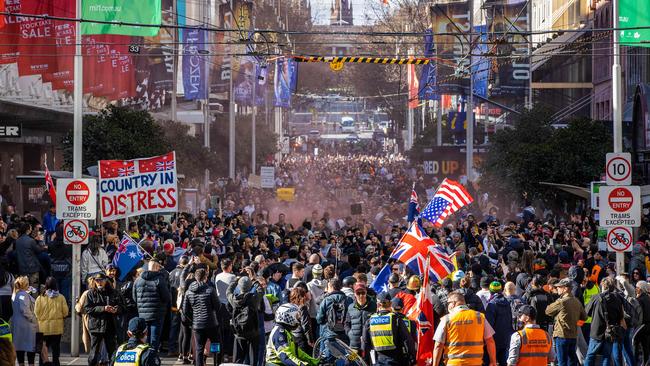 Hundreds of maskless protesters in Melbourne’s CBD. Picture: Mark Stewart